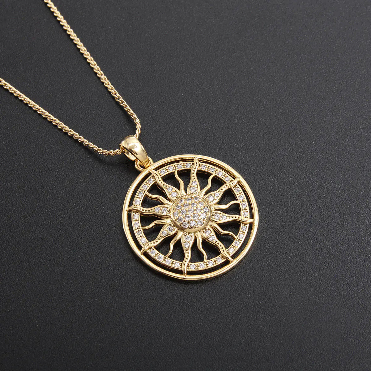 Electroplated Sun Pendant with Zircon Highlights