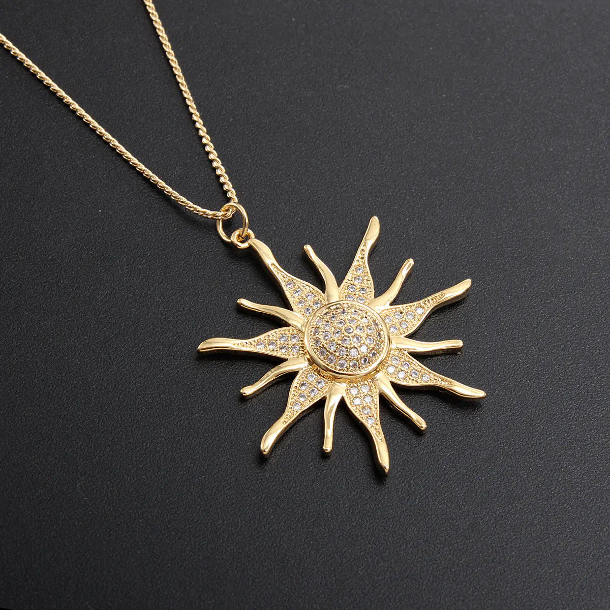 Electroplated Sun Pendant with Zircon Highlights