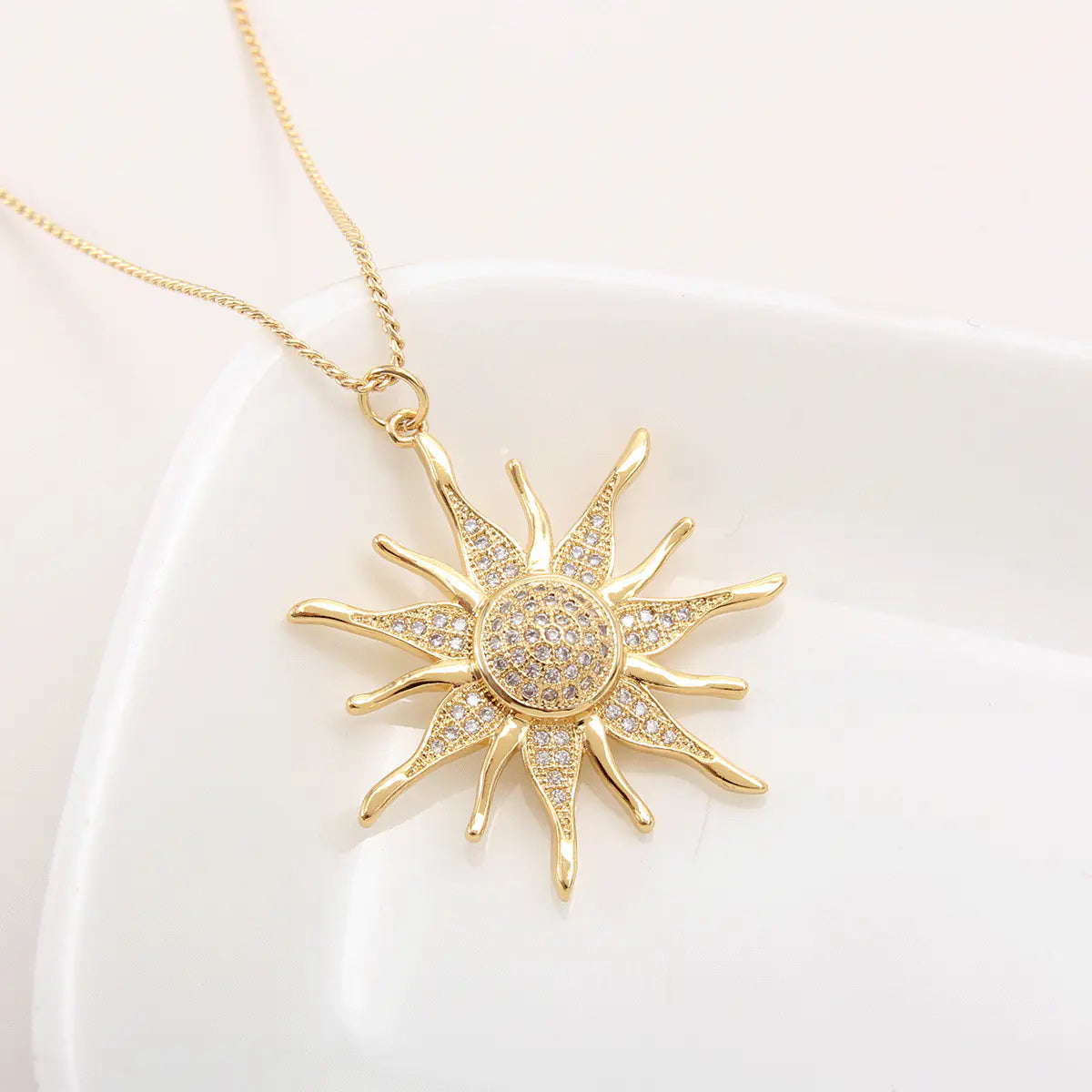 Electroplated Sun Pendant with Zircon Highlights